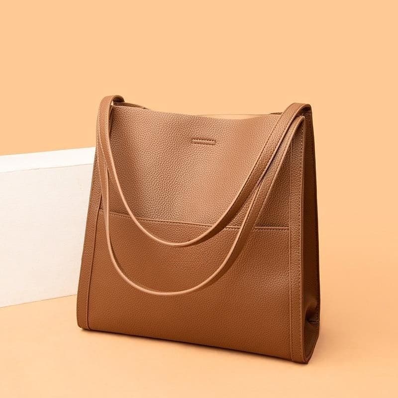 Leather carrying bag with multiple compartments