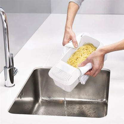 Microwave noodle cooker with integrated strainer lid