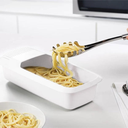 Microwave noodle cooker with integrated strainer lid
