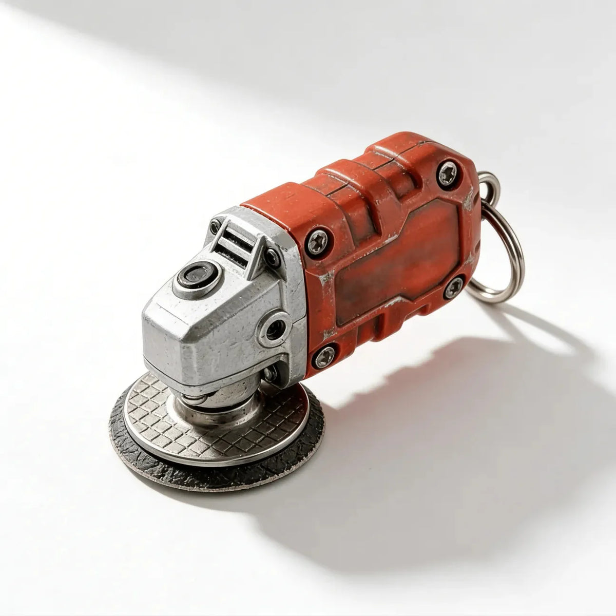 EdgeCraft™ Mini Grinder Keychain — compact, decorative, and always ready to use