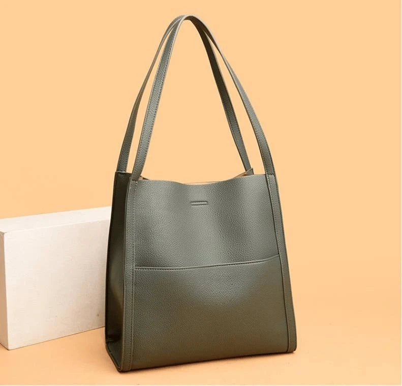 Leather carrying bag with multiple compartments