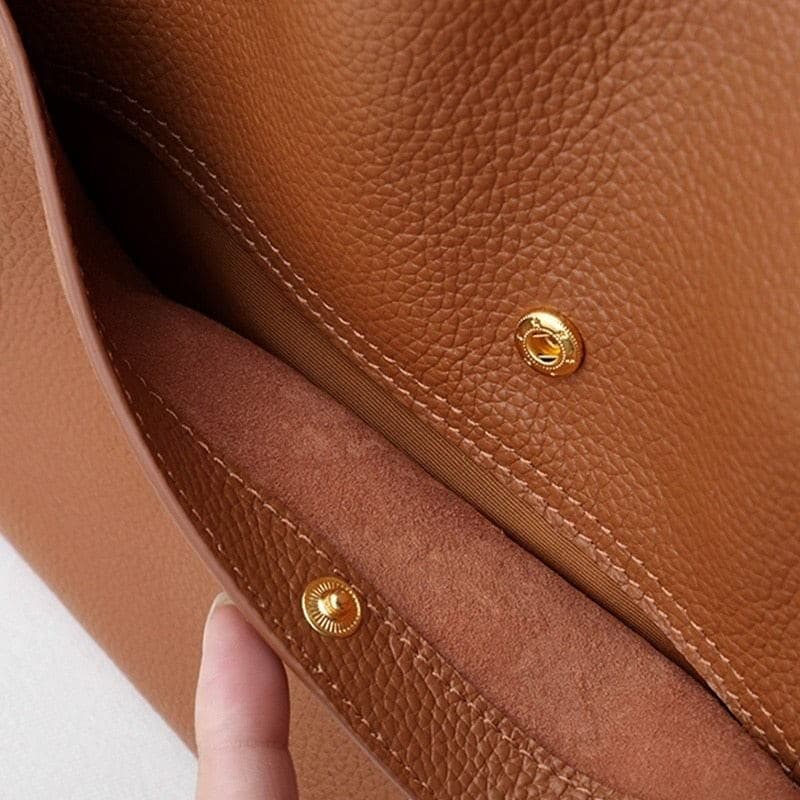 Leather carrying bag with multiple compartments