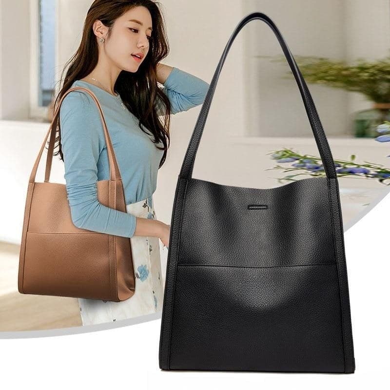 Leather carrying bag with multiple compartments