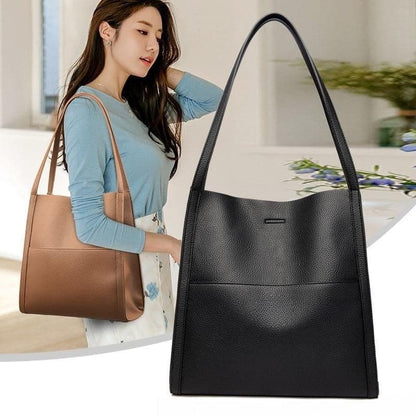 Leather carrying bag with multiple compartments