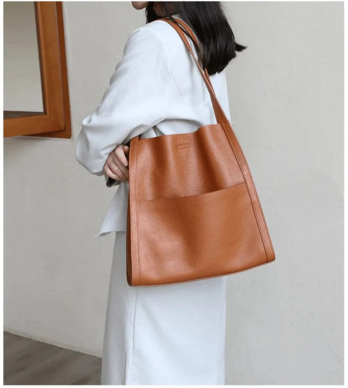 Leather carrying bag with multiple compartments