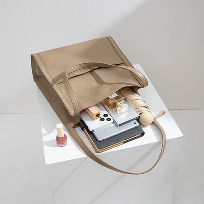 Leather carrying bag with multiple compartments